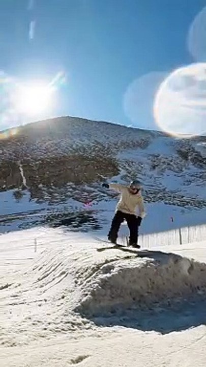 Son premier backflip en snowboard