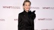Sharon Stone says being famous is a drag as she has to keep picking up $3,000 dinner tabs