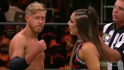 Orange Cassidy tries with Britt Baker