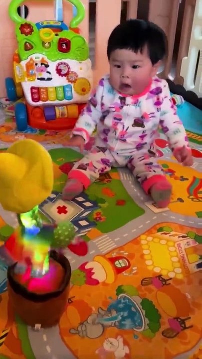 Babies play dancing cactus toy. Cutest baby funniest moments.