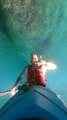 Kayaker Performs Butterfly Roll to Go Underwater