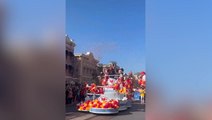 Patrick Mahomes waves to crowds with Mickey Mouse at Disneyland after Super Bowl win