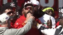 Travis Kelce belts out country song before Mahomes pulls mic away at Chiefs victory parade