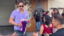Tiger Shroff receives roses, gifts from fans on Valentine's Day; actor graciously poses for pics