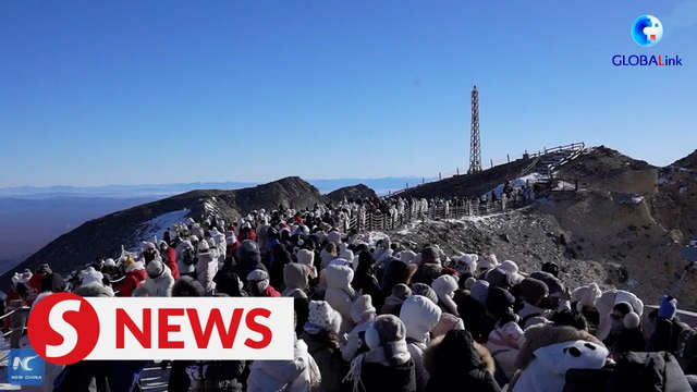 Snowmobile adventure in the snowy peaks in Changbai Mountain