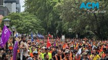 Queensland workers have marched to parliament, calling for a heat policy