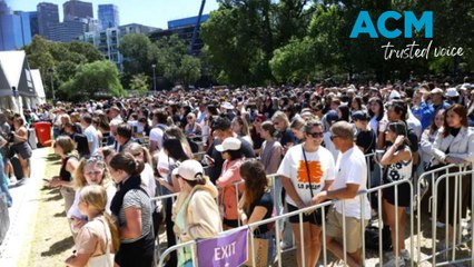 Taylor Swift fans queue for merchandise outside the MCG ahead of her Melbourne concert