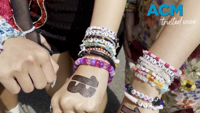 Swifties, Taylor Swift fans, exchange friendship bracelets with each other at the Melbourne show.