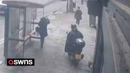Moment moped thief casually nicks man's £1k iPhone in broad daylight