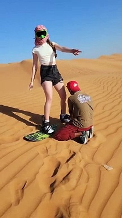 Sandboarding in desert safari Dubai