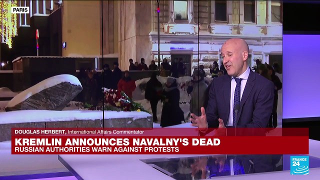 People lay floral tributes in Moscow to Putin foe Alexei Navalny