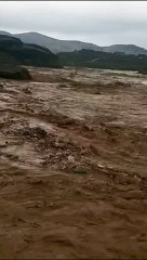 Iranian river BURSTS banks following heavy rains #shorts