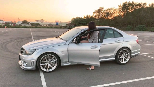 Girl drifting Mercedes C63 AMG