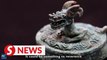 Chinese dragon in their eyes: archaeologists and animation artist