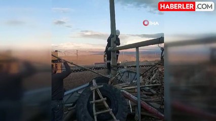 Kars'ta direkte mahsur kalan kedi kurtarıldı