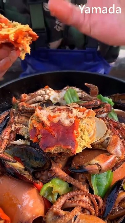 Eating yummy Mukbang seafood king crabs king snails noodle soup octopus shrimps mussel squids and sea cucumber