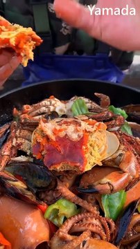 Eating yummy Mukbang seafood king crabs king snails noodle soup octopus shrimps mussel squids and sea cucumber