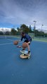 Guy Standing on Balance Boards Attempts Multiple Basketball Tricks