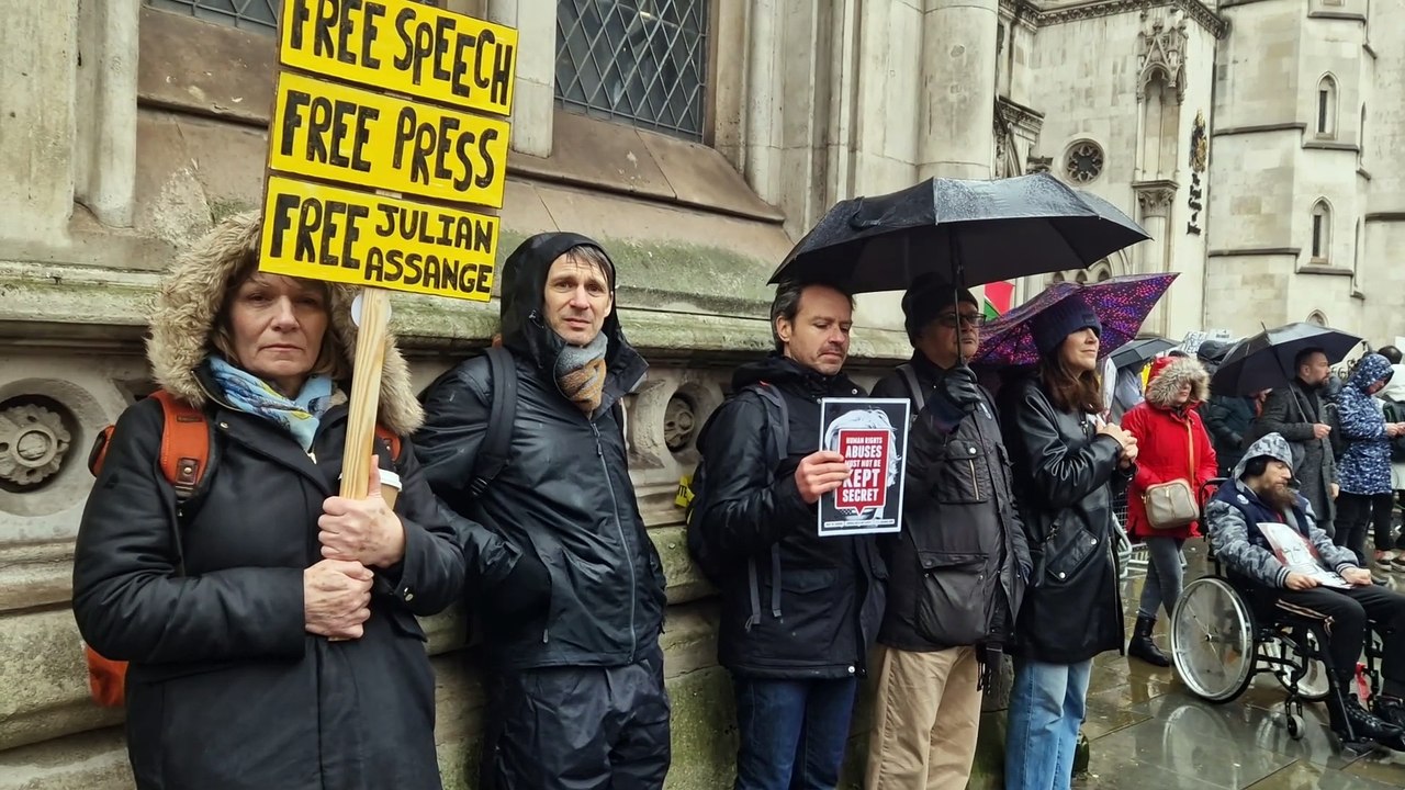 Julian Assange supporters gather outside High Court