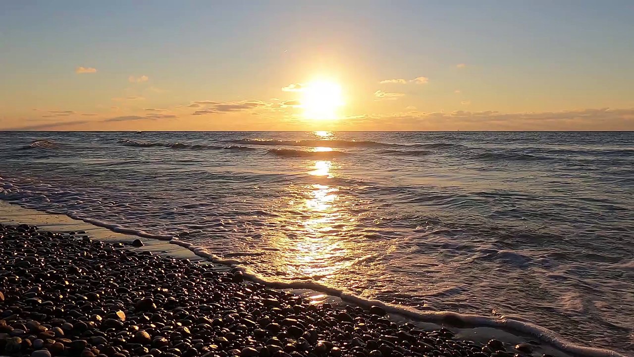 Beach wave and sunset