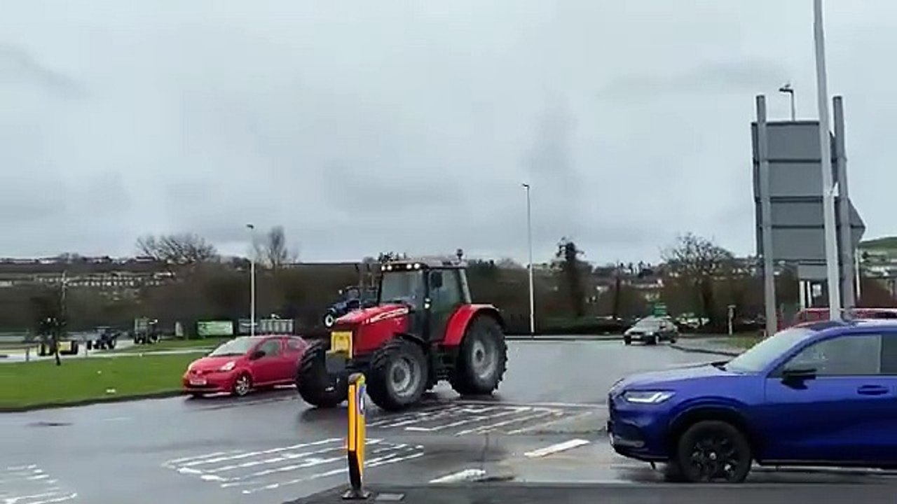 Angry farmers drive tractors to Aberystwyth to take part in protest