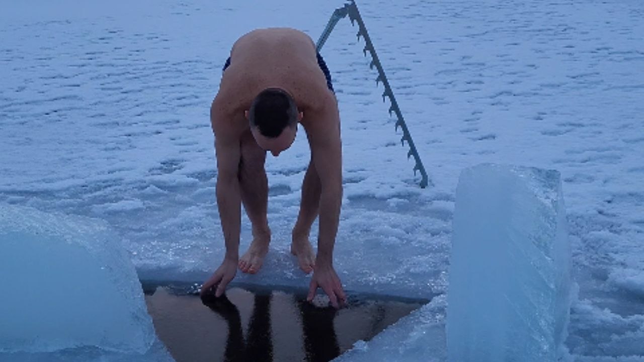 Adventurous Man takes a bath and dip in Frozen...
