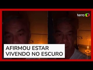 Alexandre Correa grava vídeo à luz de velas e diz estar morando de favor: 'Sem luz há seis dias'