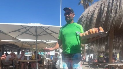 Chill dude has a fun way of selling his Chicken Burgers and entertaining people