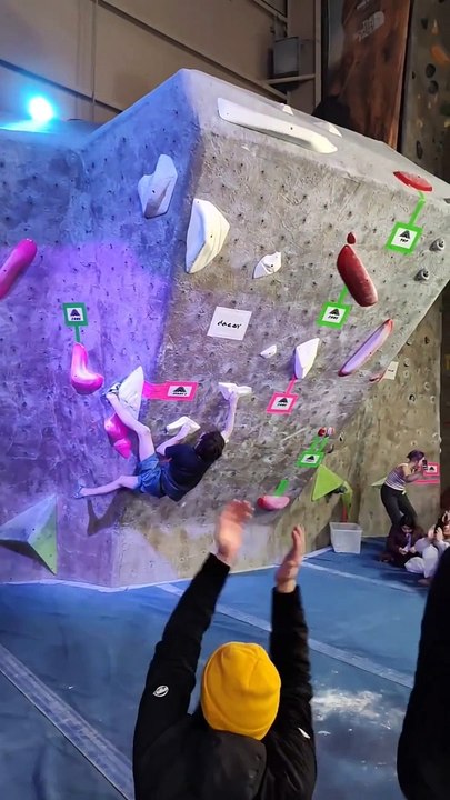 Rock climber wins a competition with an insane walk off bathang sequence, crowd goes wild.