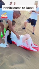 Sandboarding at Dubai Safari Desert with Al Qudra Tours