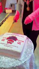Cardigan Mayor cuts bookshop celebration cake