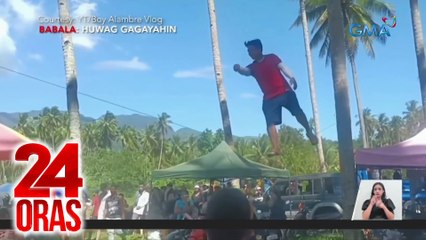 Lalaki sa Agusan del Norte, tumutulay sa alambre habang buhat ang 2 troso na 50 kg ang bigat | 24 Oras