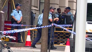 Gunman arrested after 77-year-old in Sydney CBD