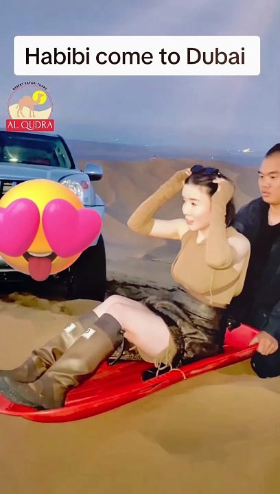 Sandboarding enjoyning in Dubai Safari Desert