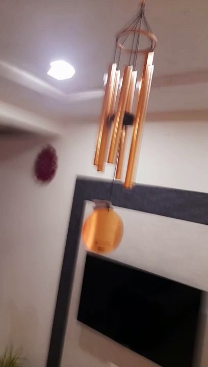 Inviting Serenity Transform Your Balcony with Big Wind Chimes