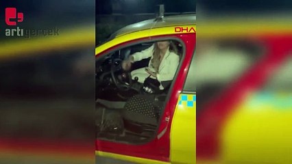 Ücret ödemek istemeyen kadın taksiye zarar verdi, polise saldırdı