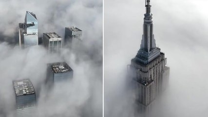 Empire State Building swallowed by thick fog in spectacular drone video