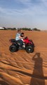 Quad bike ride in desert safari Dubai, Uae desert