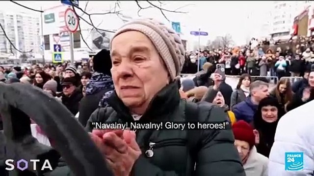 Russians gather in subdued defiance to lay 'fearless' Kremlin critic Navalny to rest