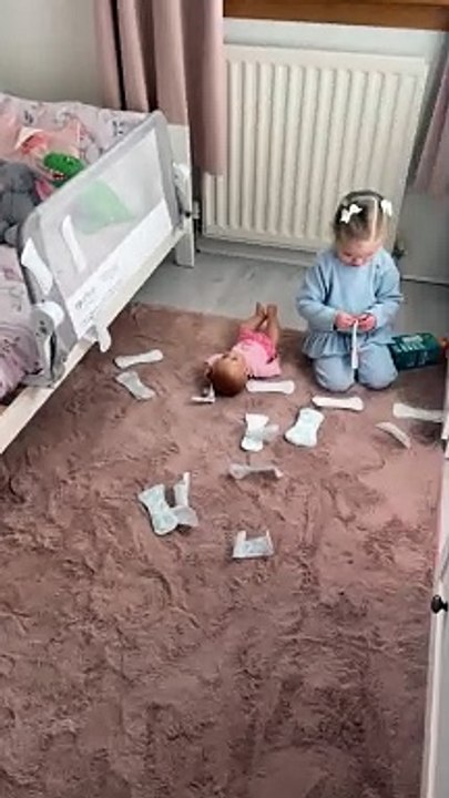 Toddler Plays With Pads