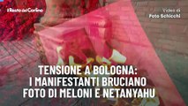 Tensione a Bologna: i manifestanti bruciano foto di Meloni e Netanyahu