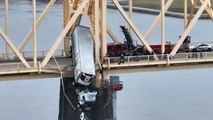 Truck dangles off Kentucky bridge forcing dramatic rescue