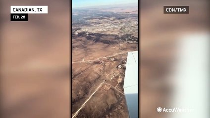 Plane flies over scorched earth in Texas