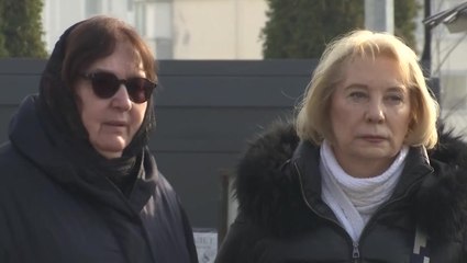 Alexei Navalny’s mother comforted by mourners at Putin critic’s grave after funeral