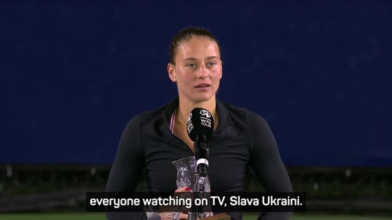 Emotional Kostyuk dedicates trophy to family in Ukraine