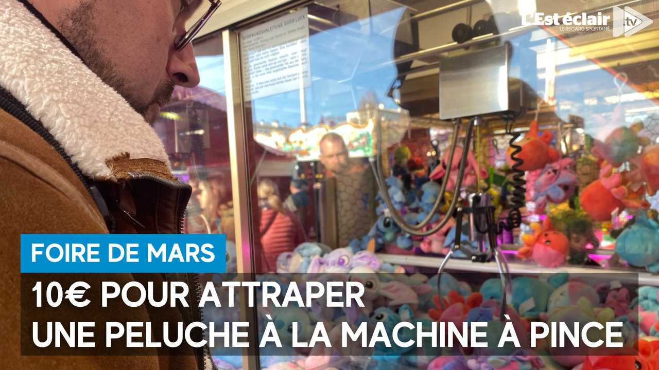 10€ pour attraper une peluche à la machine à pince à la Foire de mars ...