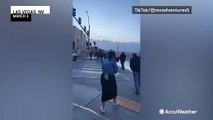 Las Vegas residents and visitors battle high winds