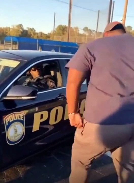 Cop does dance off with a man who approached him in the parking lot