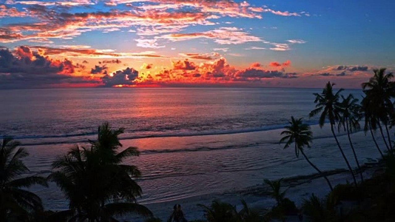 Bright orange sunset on beach