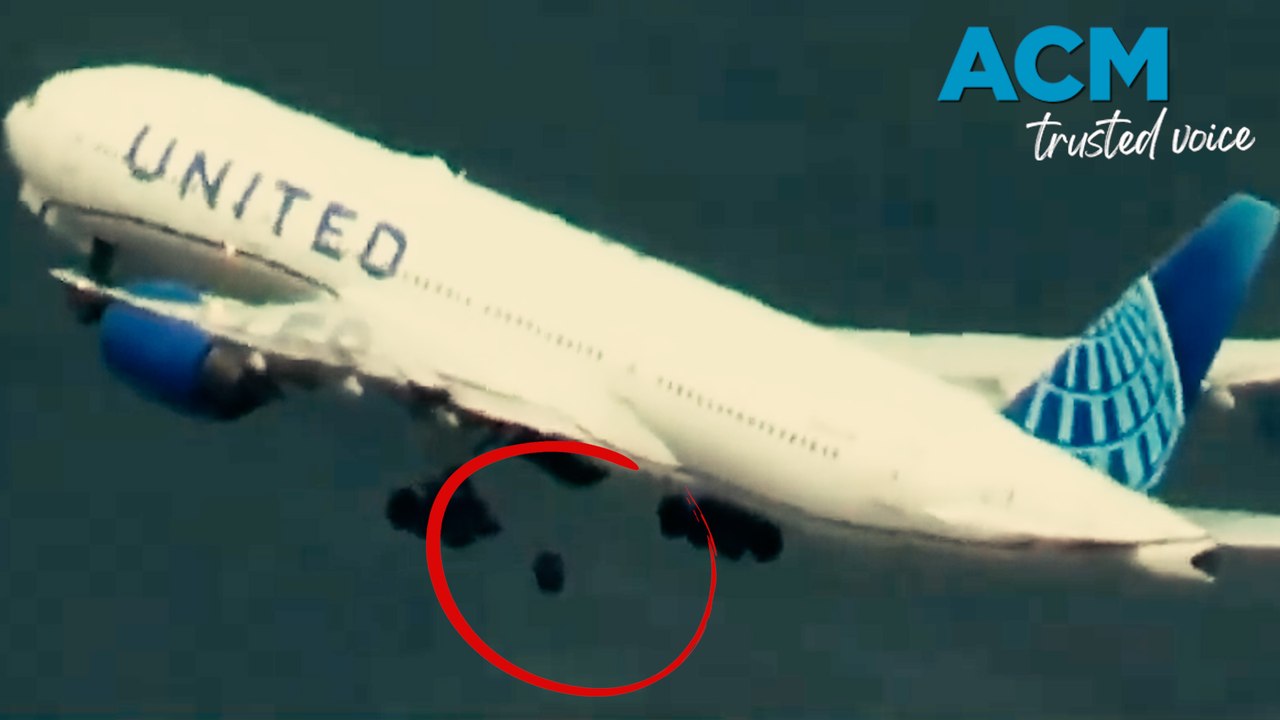 Terrifying moment wheel falls of United airplane